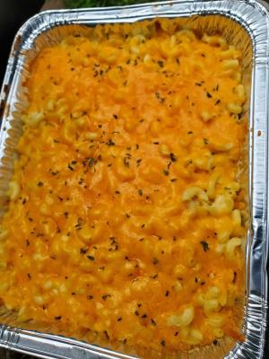 Southern style Mac and Cheese made with Gouda and a Variety of Cheeses smoked on the grill to vreate a  Creamy, rich, ooey-gooey, super cheesy southern favorite. 
